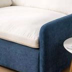 Poltrona singola in ciniglia oversize con seduta profonda e cuscini decorativi