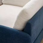 Poltrona singola in ciniglia oversize con seduta profonda e cuscini decorativi