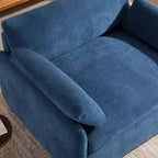 Poltrona singola in ciniglia oversize con seduta profonda e cuscini decorativi