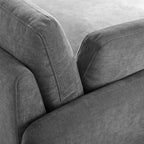 Poltrona singola in ciniglia oversize con seduta profonda e cuscini decorativi