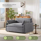 Poltrona singola in ciniglia oversize con seduta profonda e cuscini decorativi