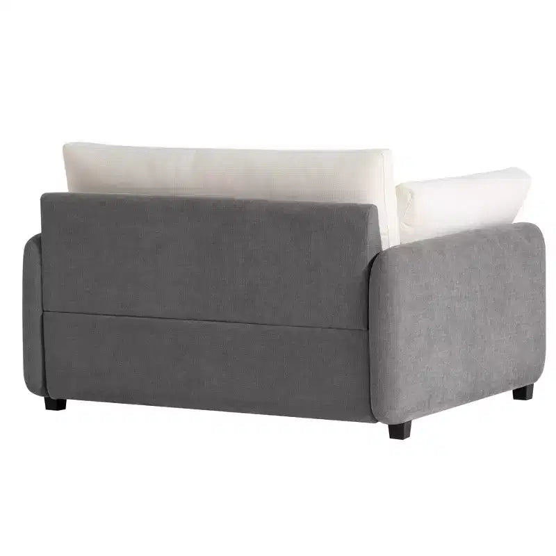 Poltrona singola in ciniglia oversize con seduta profonda e cuscini decorativi