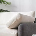 Poltrona singola in ciniglia oversize con seduta profonda e cuscini decorativi