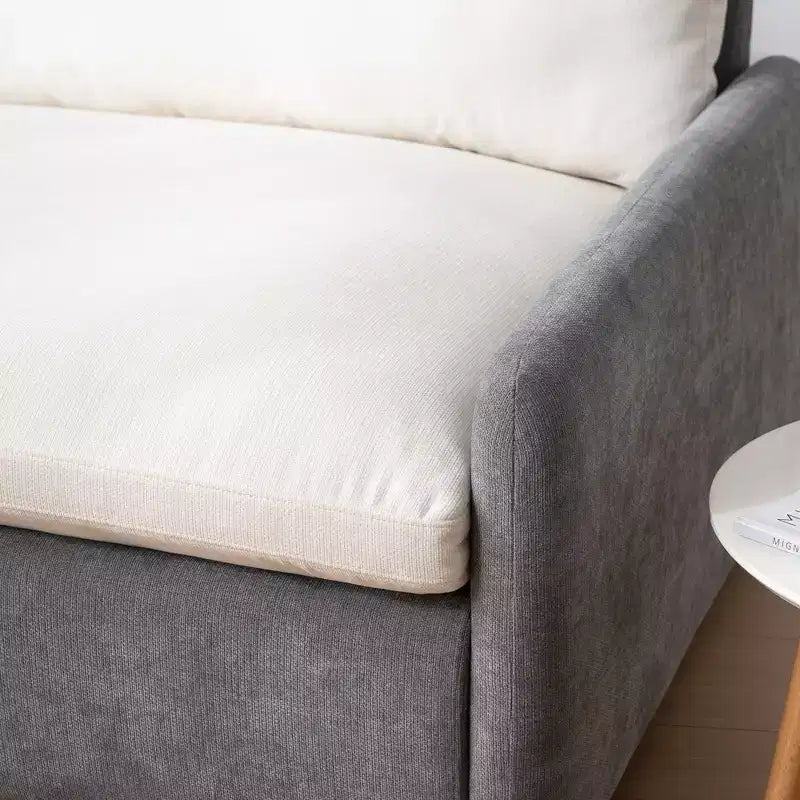 Poltrona singola in ciniglia oversize con seduta profonda e cuscini decorativi