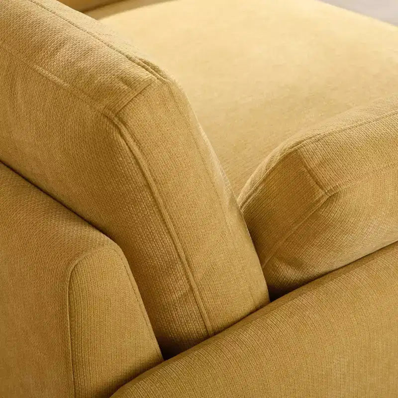 Poltrona singola in ciniglia oversize con seduta profonda e cuscini decorativi