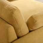 Poltrona singola in ciniglia oversize con seduta profonda e cuscini decorativi