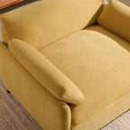 Poltrona singola in ciniglia oversize con seduta profonda e cuscini decorativi