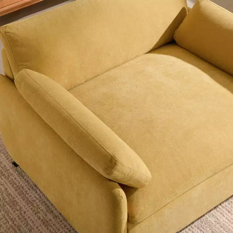 Poltrona singola in ciniglia oversize con seduta profonda e cuscini decorativi