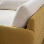 Poltrona singola in ciniglia oversize con seduta profonda e cuscini decorativi