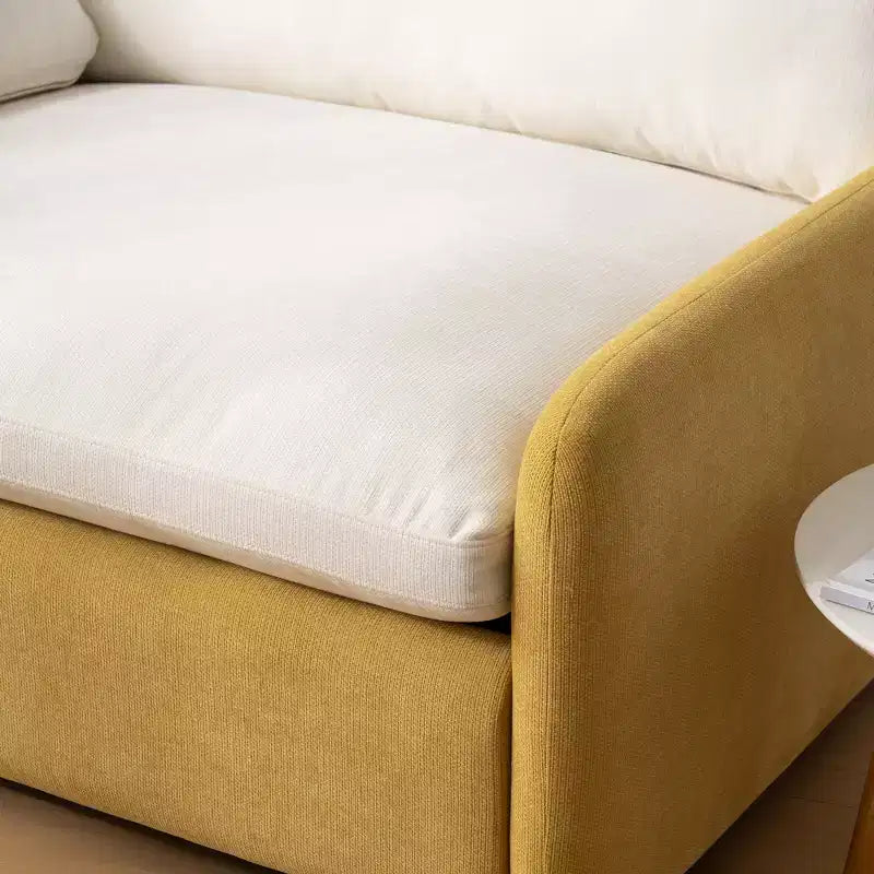 Poltrona singola in ciniglia oversize con seduta profonda e cuscini decorativi