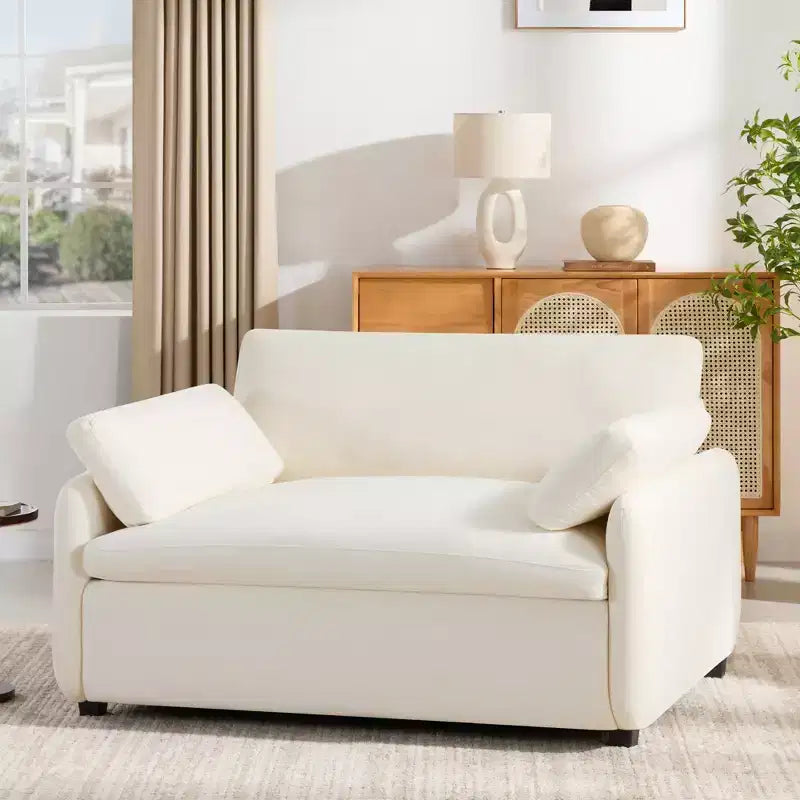 Poltrona singola in ciniglia oversize con seduta profonda e cuscini decorativi